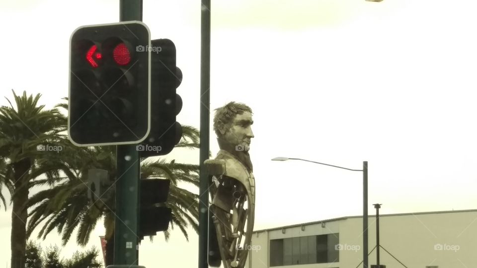 traffic lights and a statue