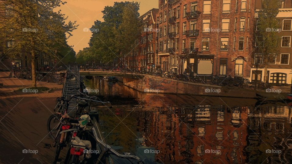 Picture of the canals in Amsterdam. Filled with cultural elements of the wonderful location. Added effect to really bring the picture to life.
