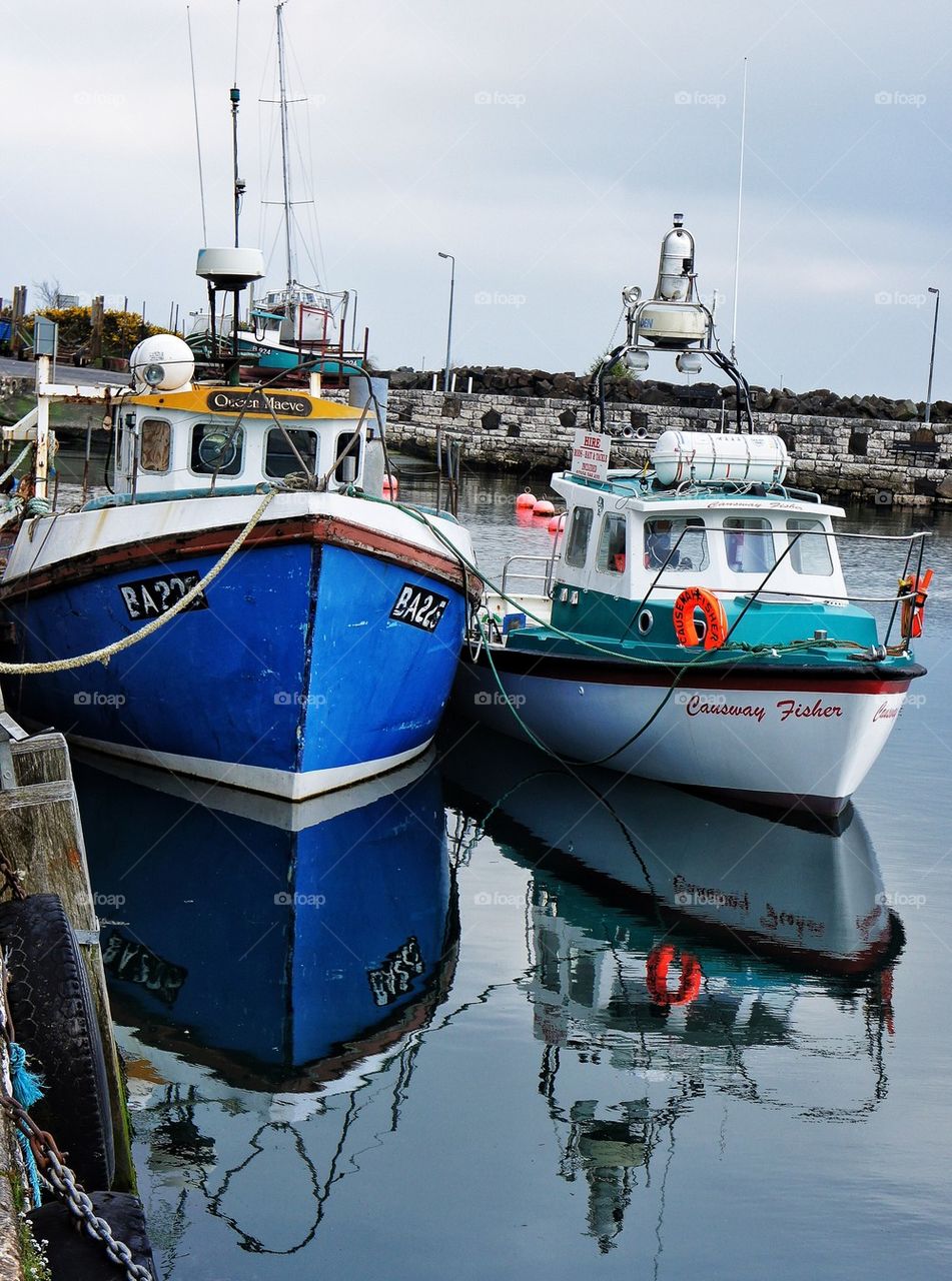 Boats reflecting