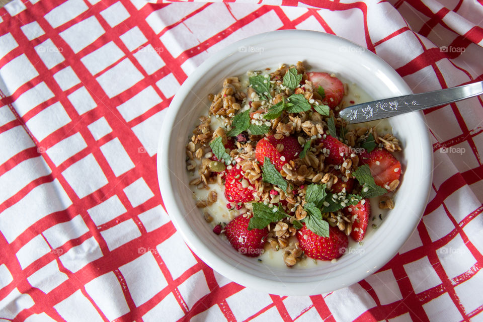 Yogurt and fruit in bowl