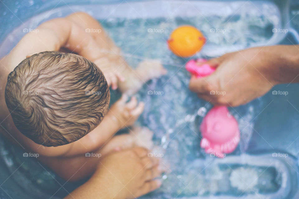 A baby's bath routine
