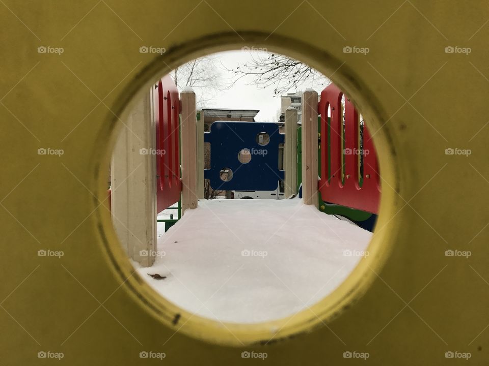 Children's playground in winter