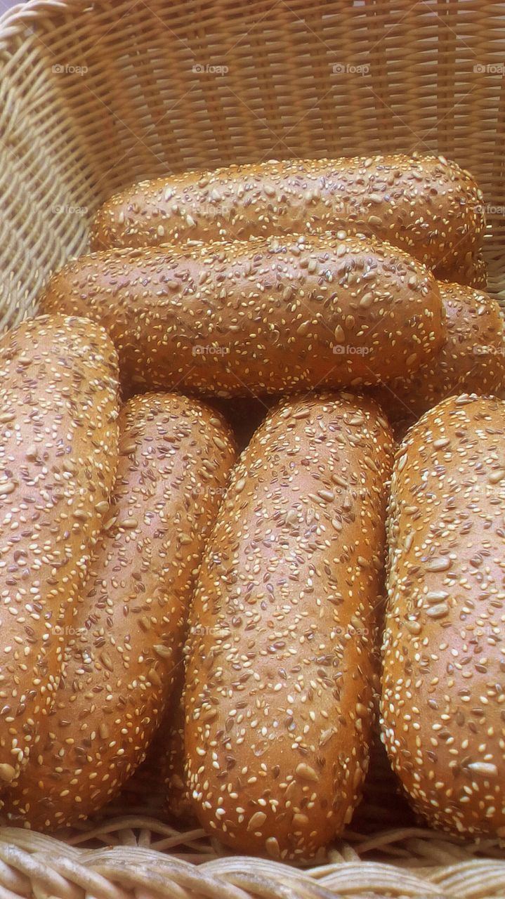 Fresh rolls on straw basket