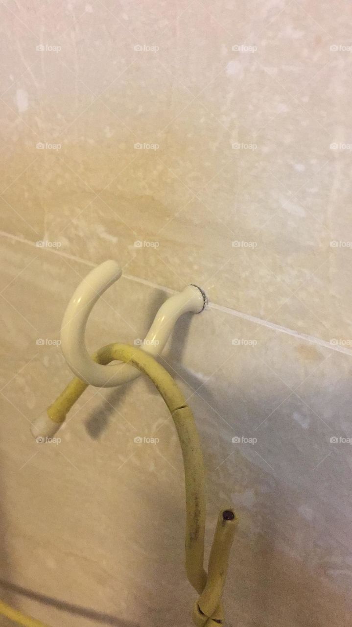 Nifty Hook between Bathroom Tiles