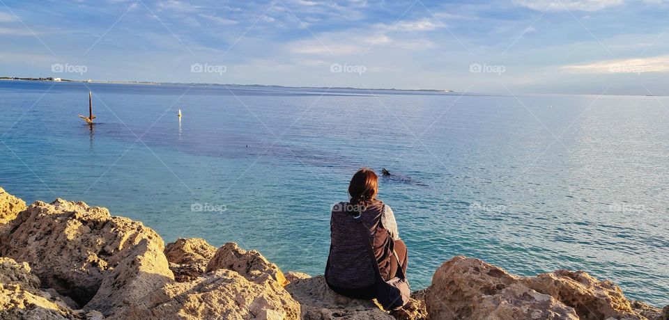 Enjoying coastal views at the Omeo shipwreck, Coogee beach Western Australia.