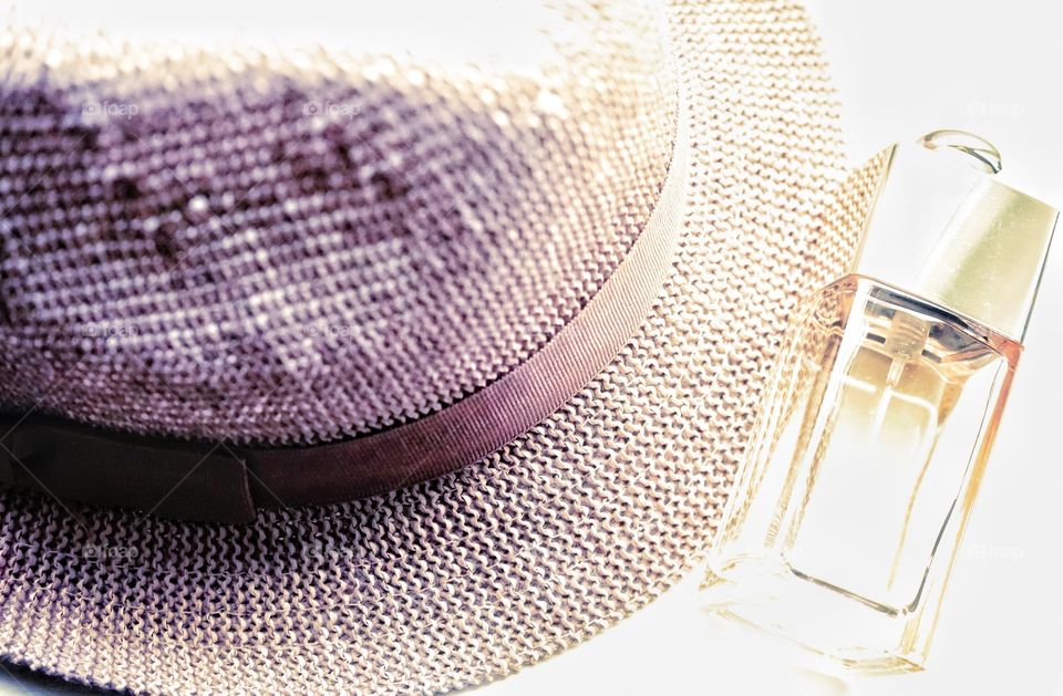 Day no people indoors close-up Art Textured Colors pink Hat Dior perfume sprayer glass