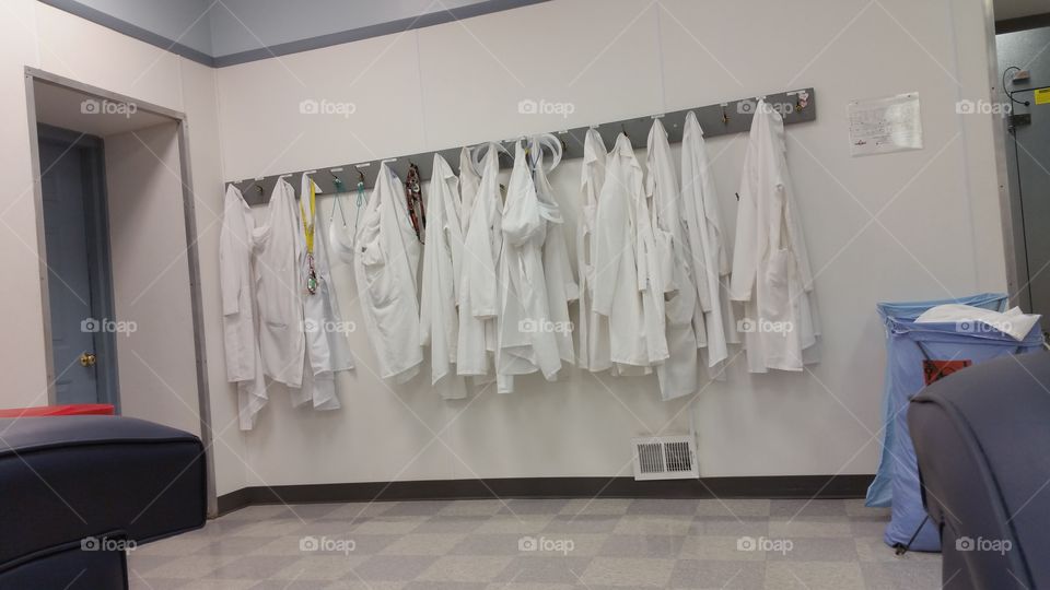 white coats. donating plasma