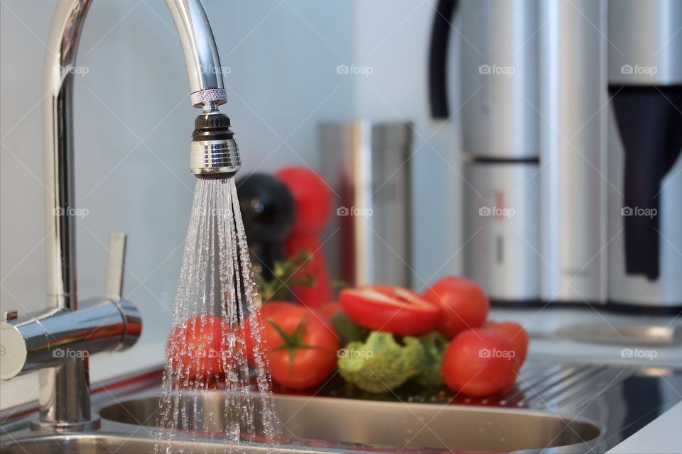 rinsing tomatoes and other vegetables