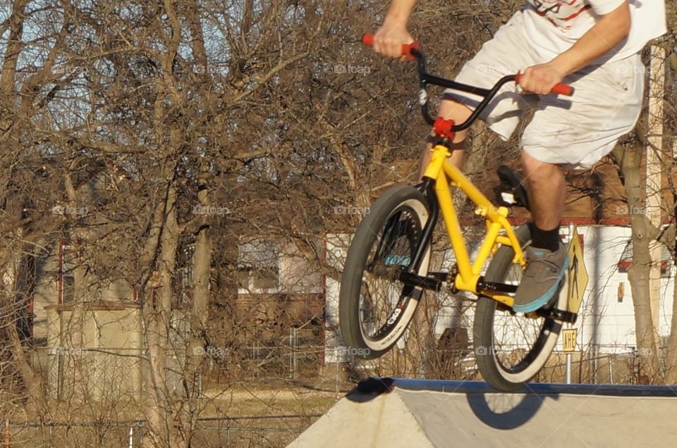 Yellow bike . Tricks