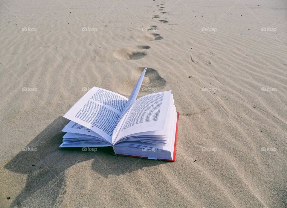 open book on the sand