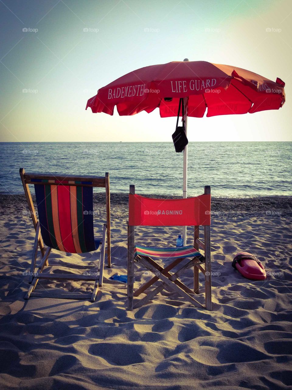 Umbrella and red chair Lifeguard station