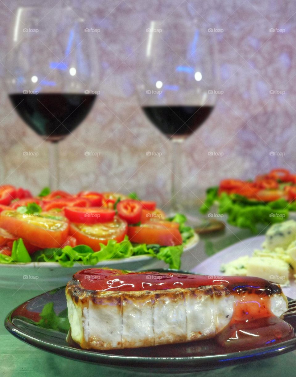 Fried cheese in lingonberry sauce