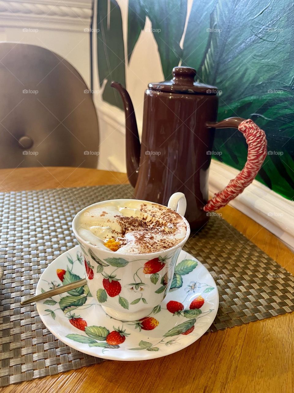 Coffee in the strawberry cup 