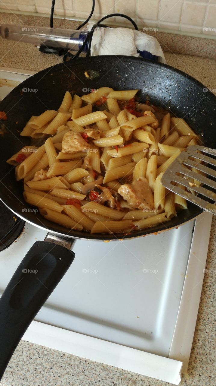 Pasta with chicken fillets and vegetables