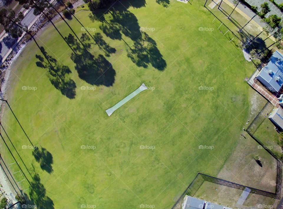 Shadow on a school cricket field