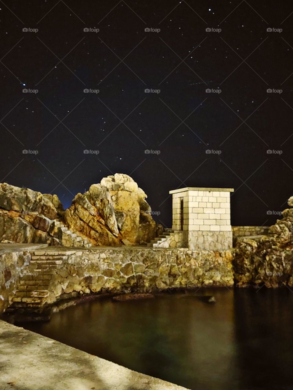 A little island at night, below the wonderful stars.