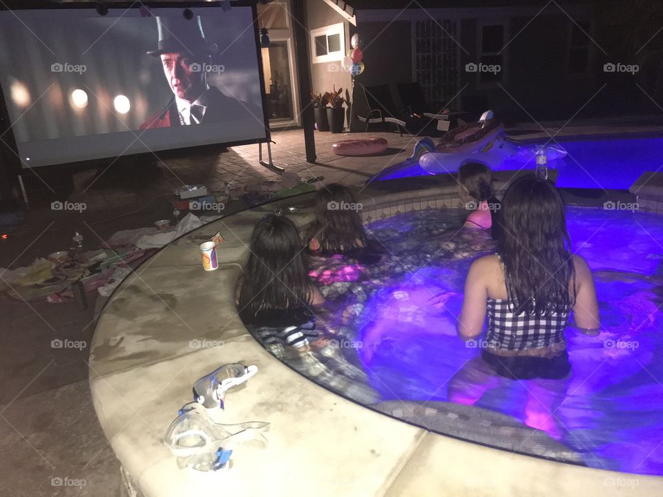 Outside movie night, in the hot tub, for Ashley’s 10th Birthday. 
