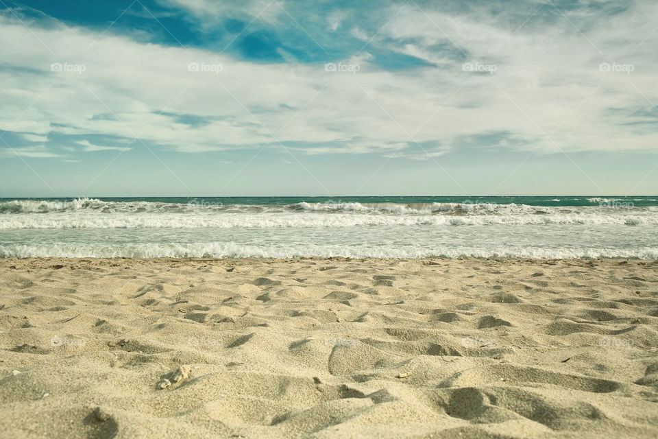 sky blue clouds sand by bussardel