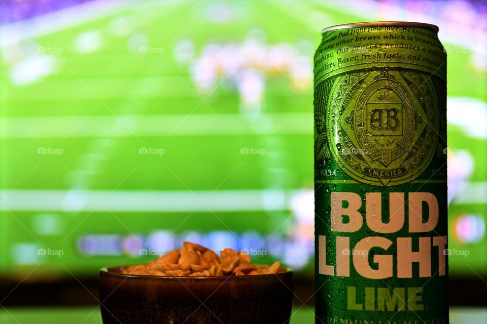 Enjoying football game night with Bud Light