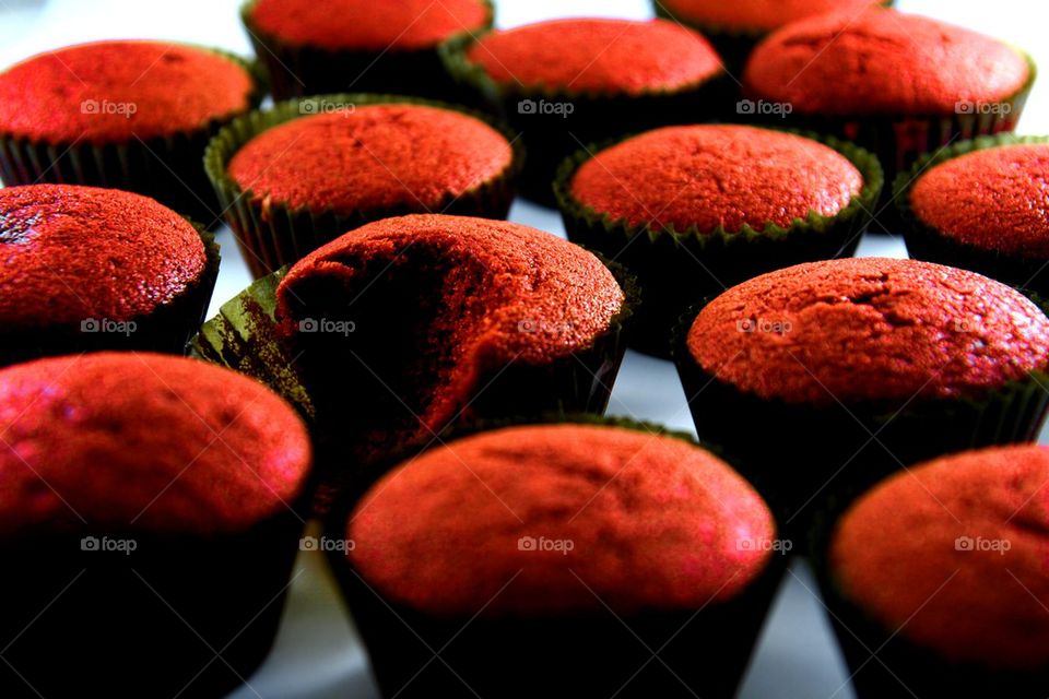 red velvet cupcakes with one bitten