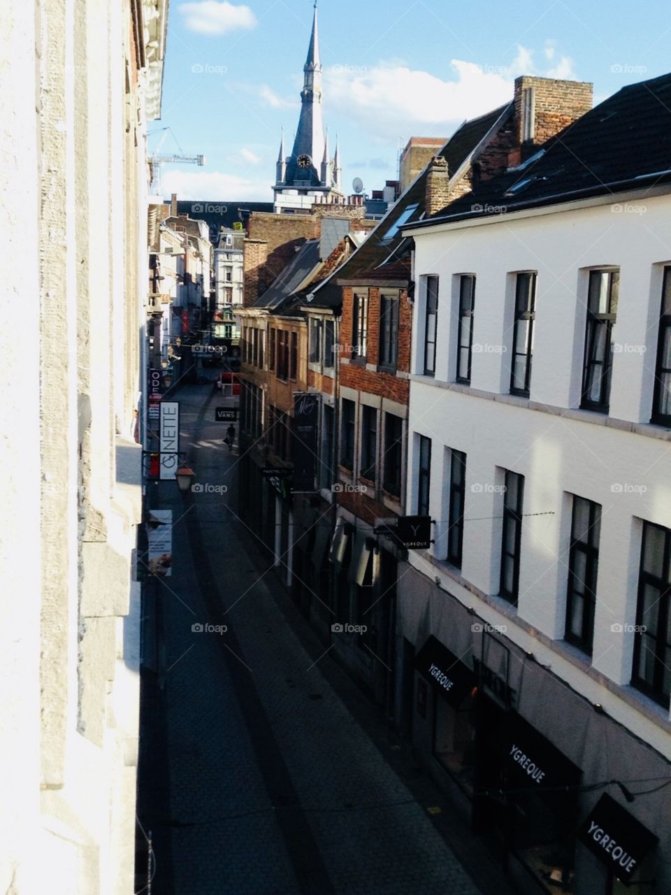 Rue Saint-Adalbert Street of shops and apartments in Liège town centre, Belgium 