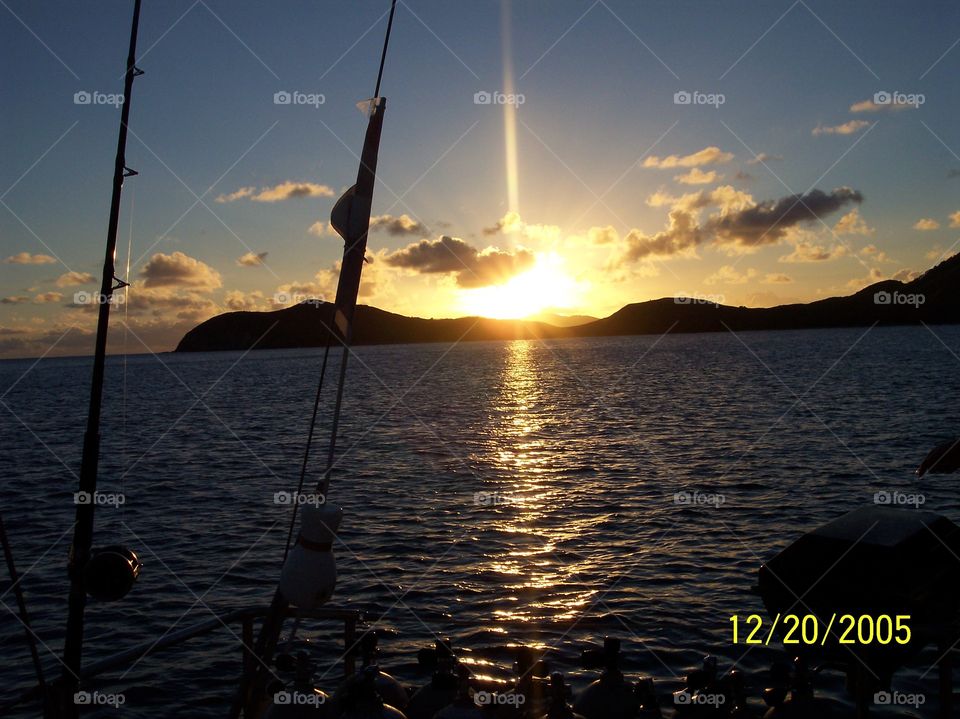 Sunset over Caribbean Sea in BVI from Sailboat. Sunset over Caribbean Sea in BVI from Sailboat