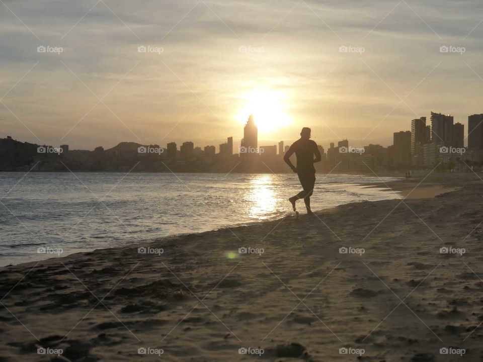Sunrise#beach#sea#human#walk#sand#city#view#sky
