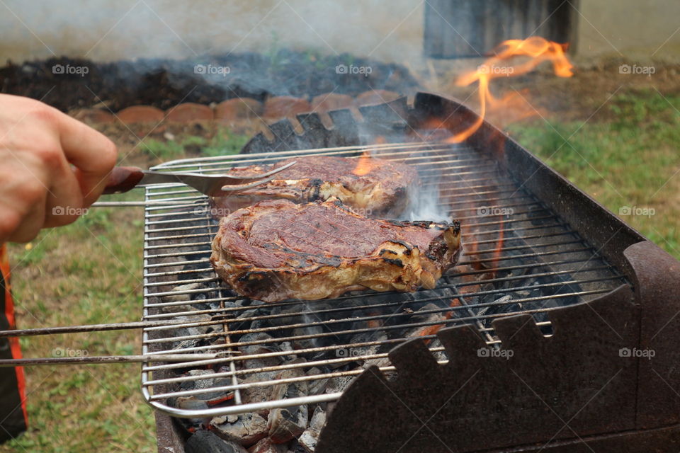 côte de bœuf steak and flames
