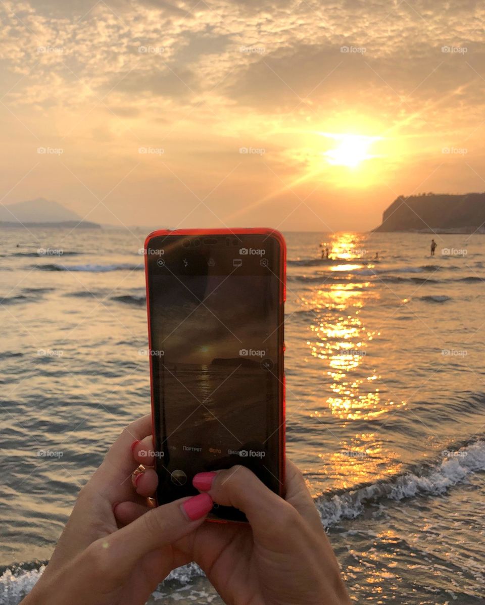 Beautiful sunset. Smartphone photography. Seashore. Amazing view.