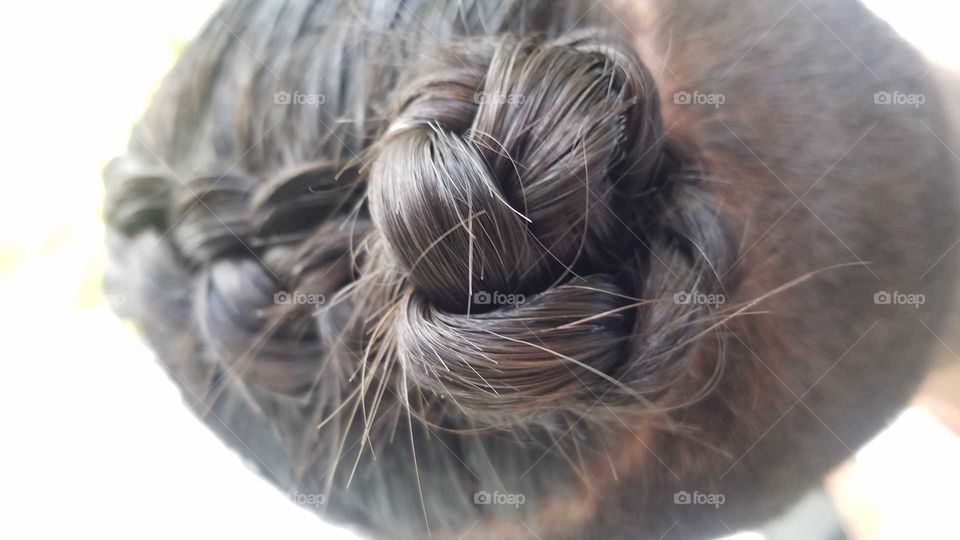 man braid-bun, beautiful hair, shiny soft and enviable hair