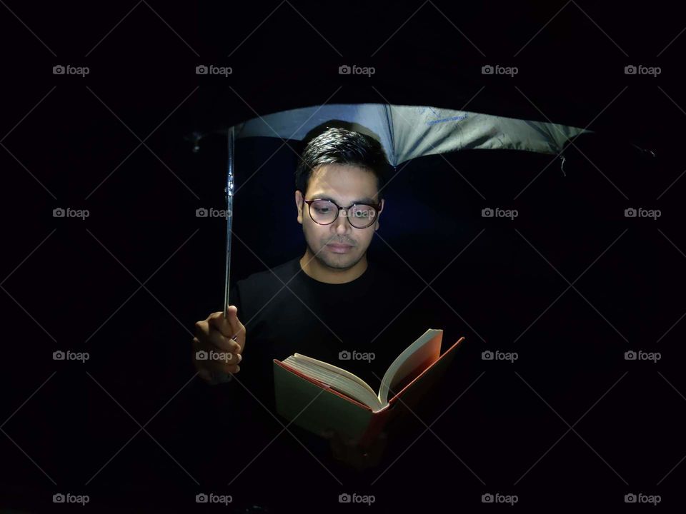 Man reading book
Portrait of young man standing