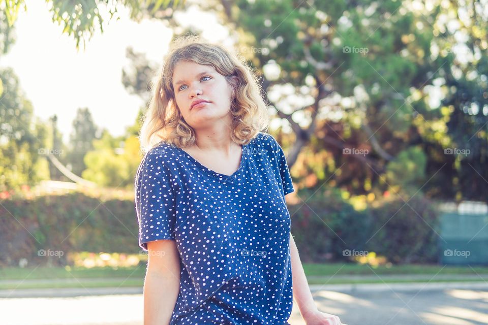 young girl in polka dot