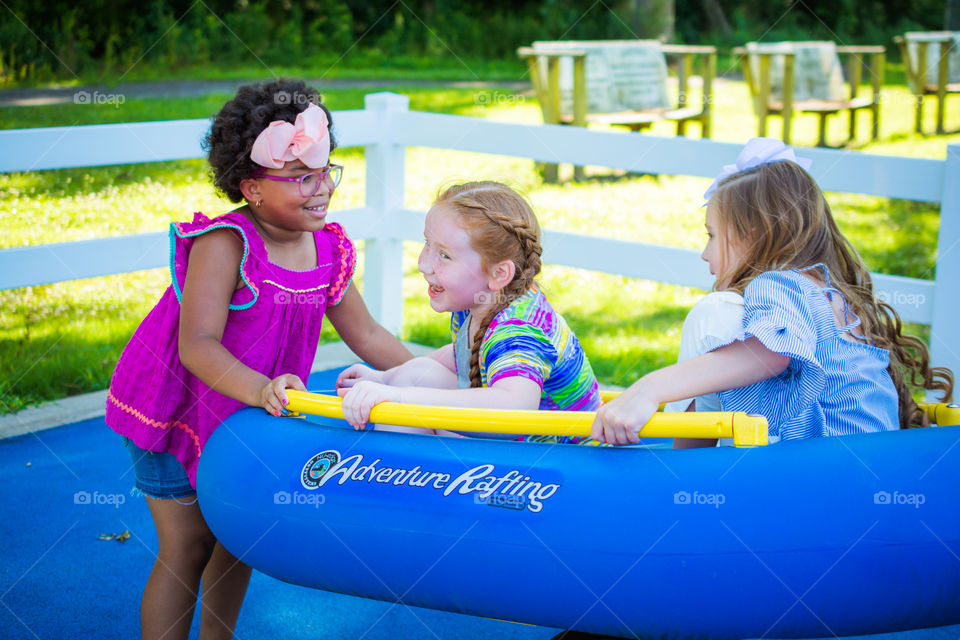 Girls Playing at the Park on a Raft 2