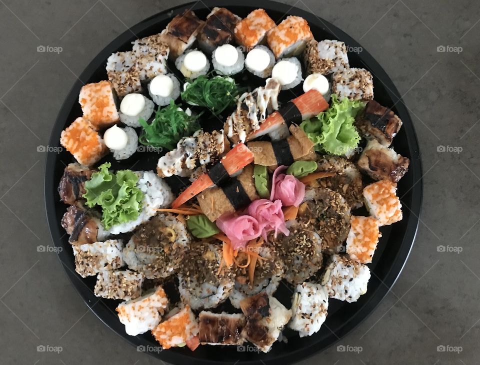 A plate of colorful sushi 