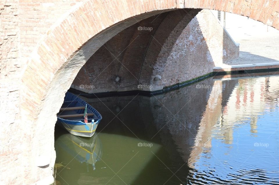 hidden boat at Comacchio, Italy