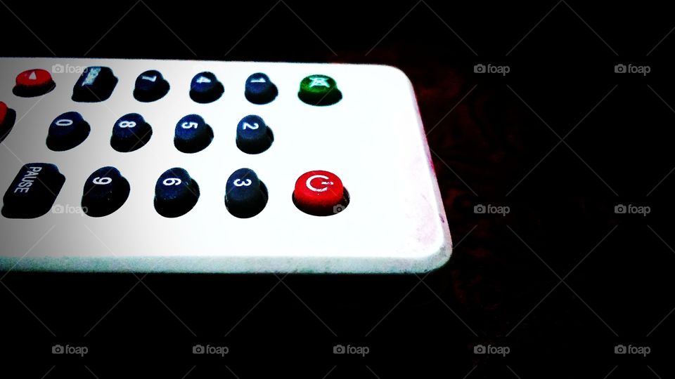 remote control on black background