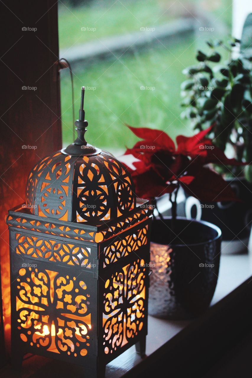 Lantern on window sill