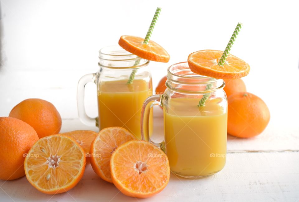 Two Glasses of Orange Juice 