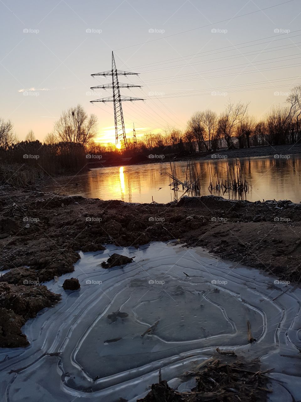 Scenic view of lake during sunset