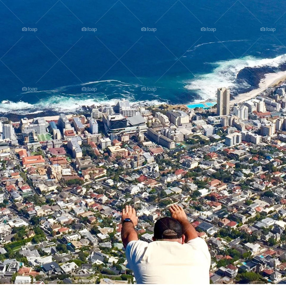 Lion's Head is a mountain in Cape Town, South Africa, between Table Mountain and Signal Hill. Lion's Head peaks at 669 metres (2,195 ft) above sea level.
...