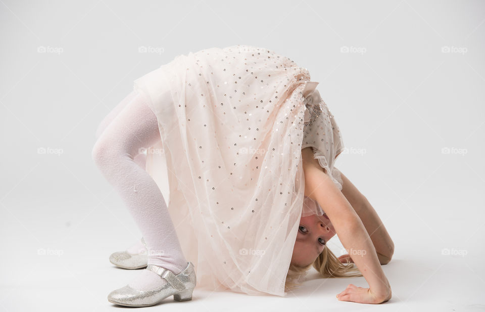 6 year old child model posing in a studio.