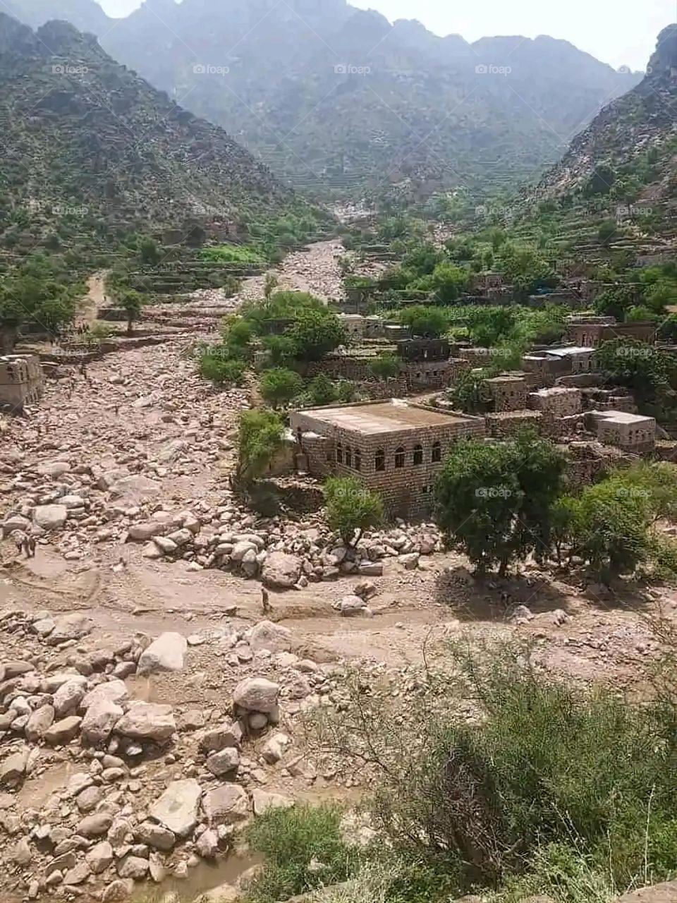 Glory be to God, the magnificent and picturesque view and the natural green trees are a view that is nothing more wonderful than it