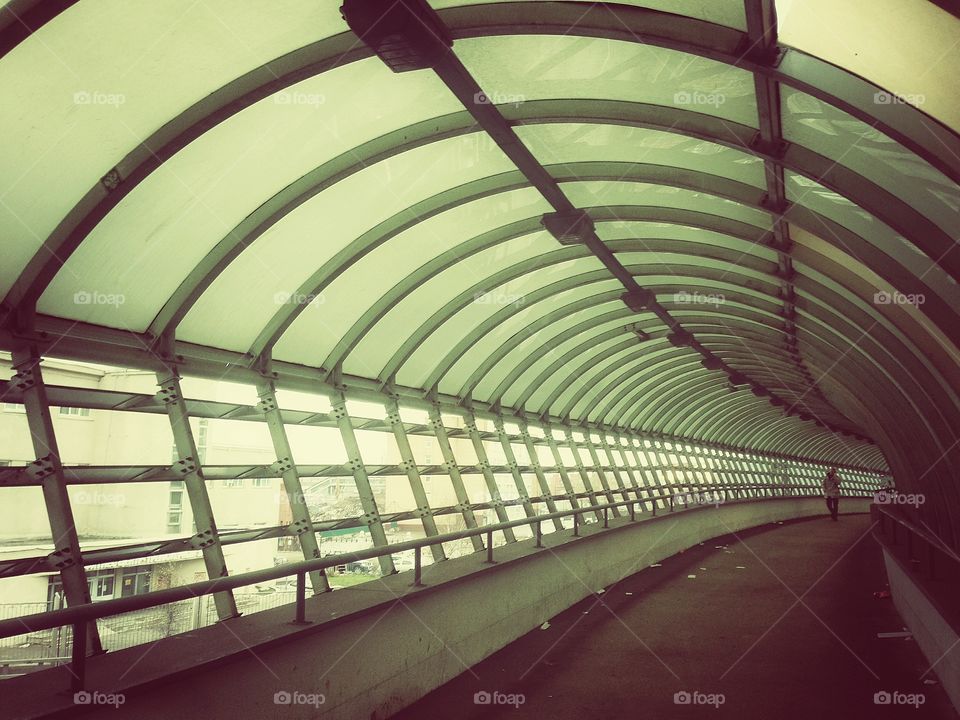 Tunnel for pedestrians made of glass and metal in Moscow, Russia