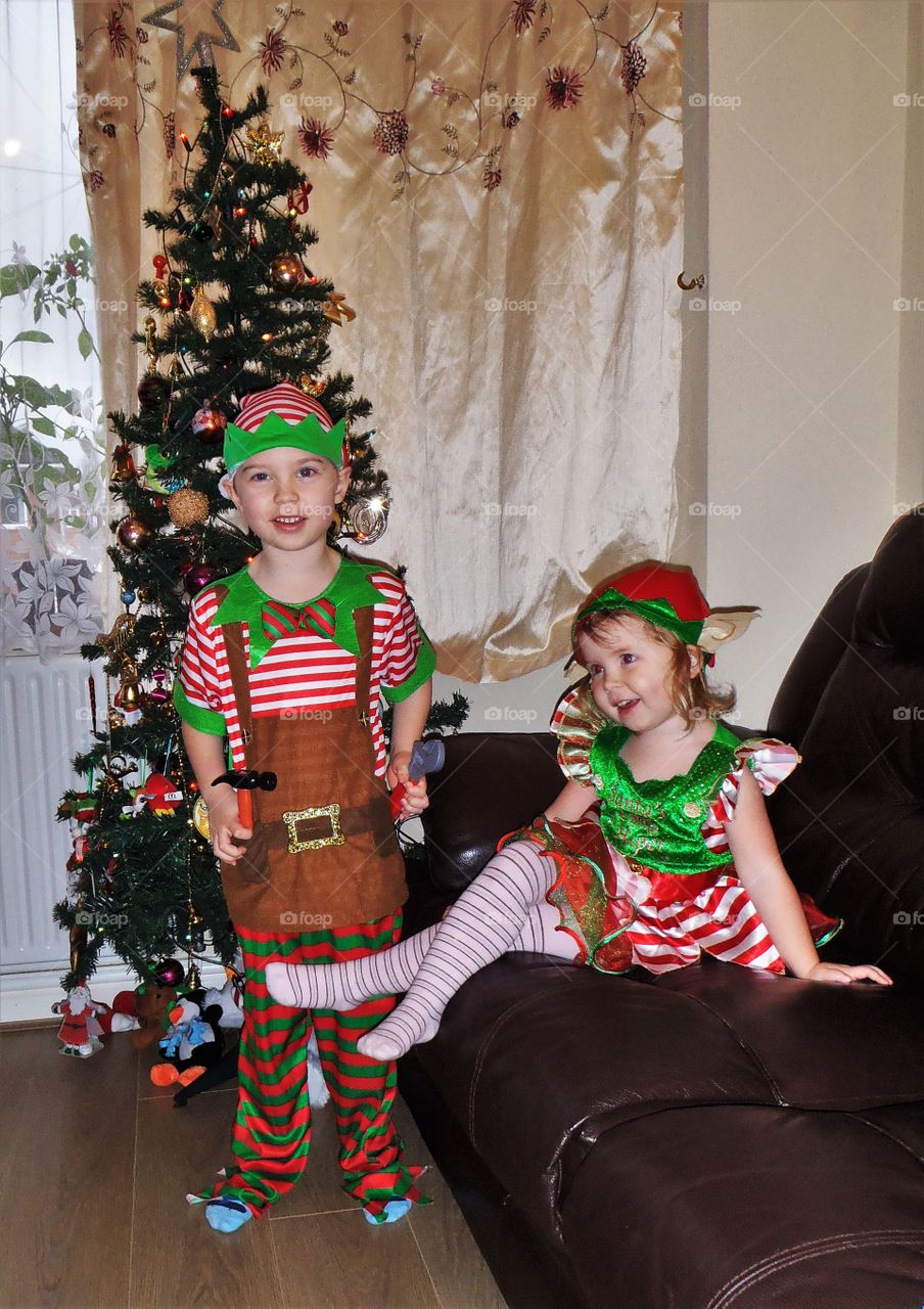 Brother and sister celebrating christmas