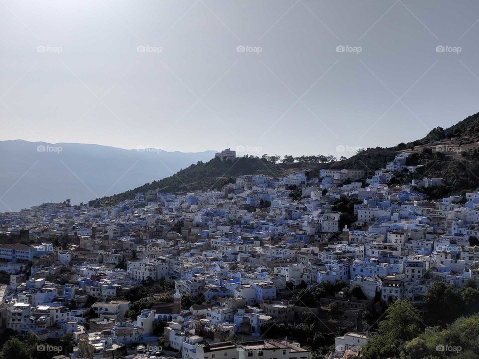 View of Chefchaouen (the Blue City in the Mountains) from Above (from a Hike) in Morocco