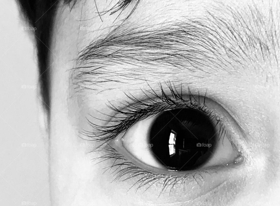 Young child’s eye in black and white