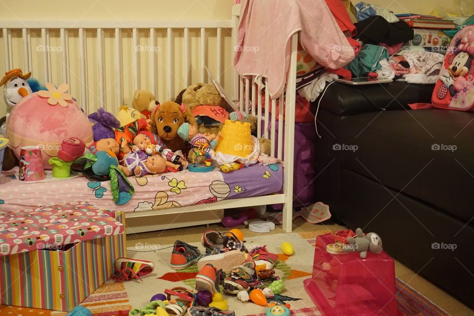 Messy room full of toys 