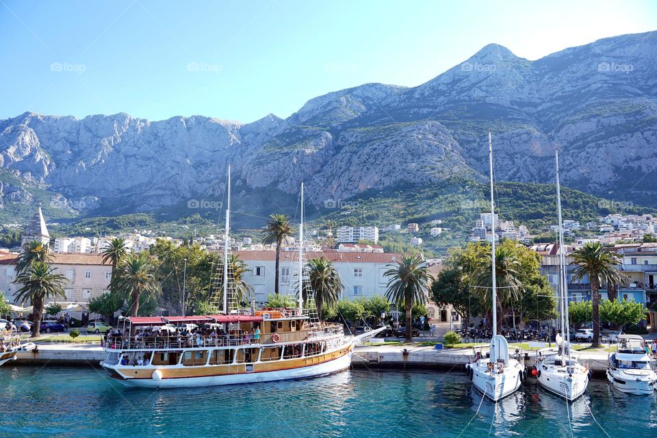 Seaport against the backdrop of mountains