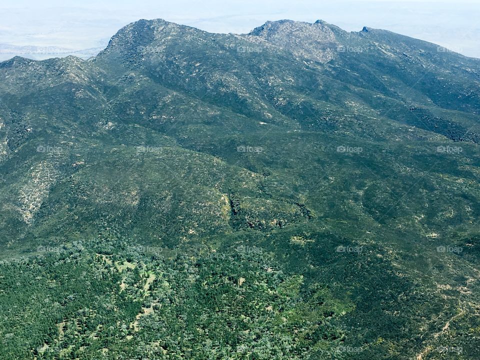 An unusual amount of rainfall this year has produced rare colour in the Flinders Ranges and wilpena pound areas of south Australia captured in this aerial view from a light plane