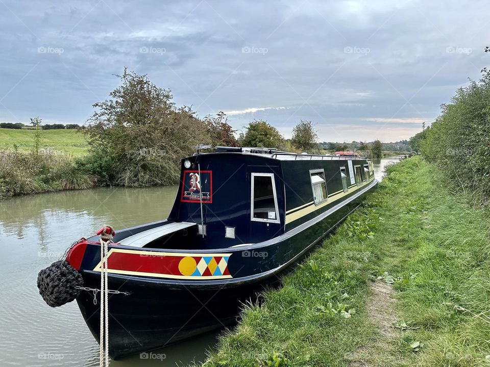 Napton Narrowboats Megan hired from the marina moored along Oxford canal north of Braunston near Daventry and Willouby England late summer cruise vacation holiday sunset